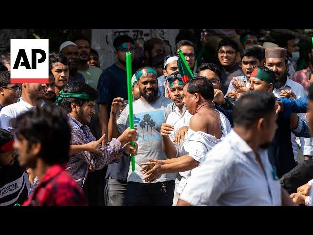 Bangladesh protesters attack supporters of Sheikh Hasina and harass journalists