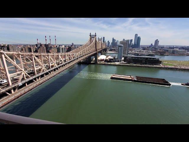 Tugboat Boat . 35 Sutton Pl . New York City View.