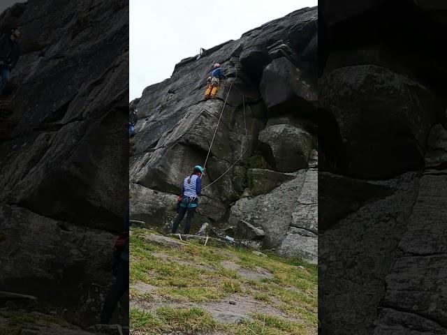 Lead climbing Twisting Crack at High Neb, Stanage North