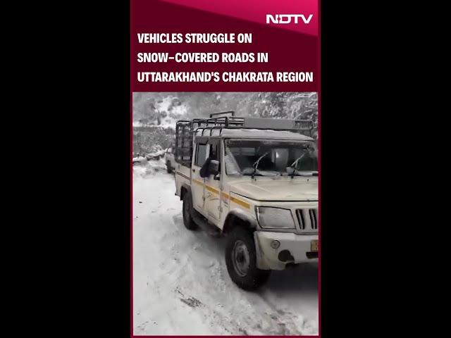 Vehicles Struggle On Snow-Covered Roads In Uttarakhand's Chakrata Region