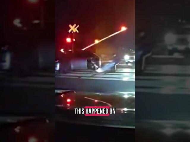 Man pulled from car seconds before train hits