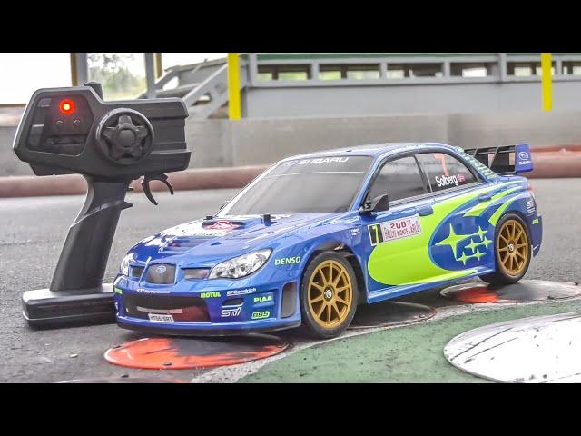 Awesome RC Car gets unboxed and driven! Tamiya Subaru Impreza 4x4!