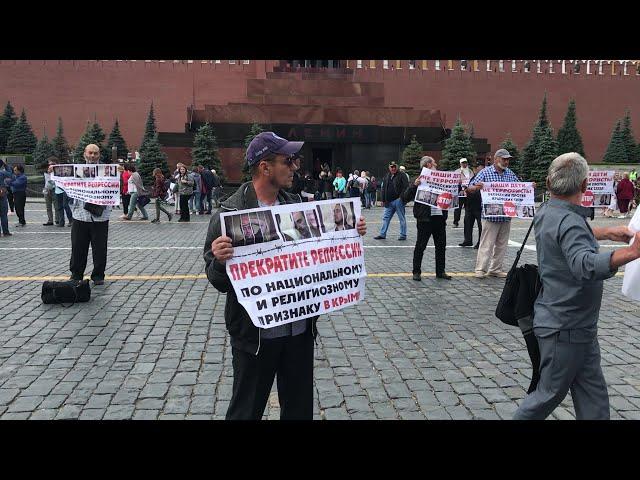 Russia detains Crimean Tatars for Red Square protest | AFP