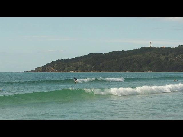 Surfing Byron Bay under the lighthouse.