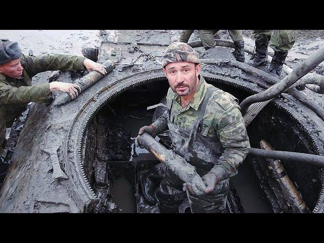 A T-34 TANK FROM THE SECOND WORLD WAR WITH THE DEAD CREW WAS TAKEN OUT OF THE RIVER