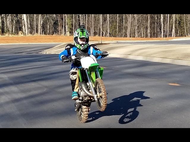 10 year old does max speed on a dirt bike. Kawasaki kx65 new!