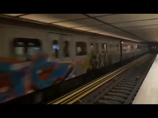 Athens Metro: A Graffitied 2nd Generation Train Passes Through Attiki Station