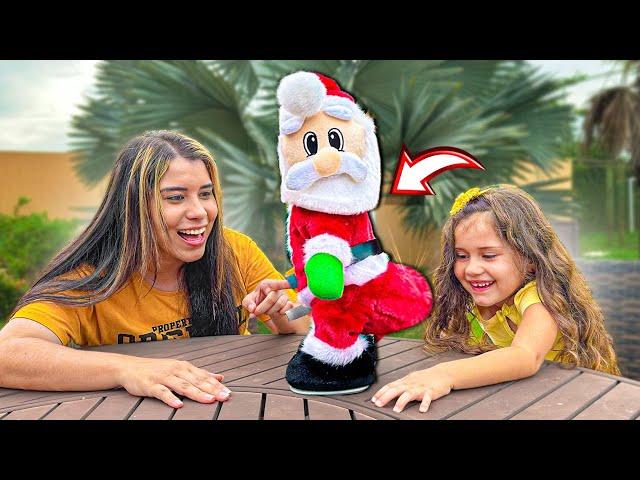 DEI UM PAPAI NOEL QUE DANÇA E MEXE O BUM BUM  PRA MINHA IRMÃZINHA !