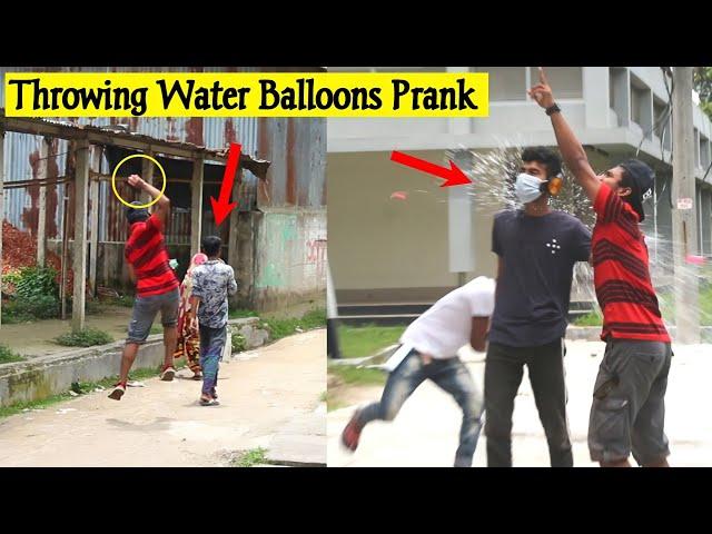 Throwing ice Water Balloons at People  Prank || By - ComicaL TV