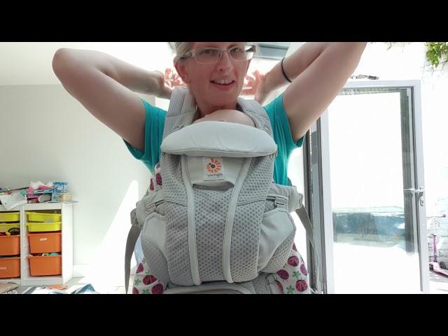 How to do the strap up behind your back on a baby carrier on your own!