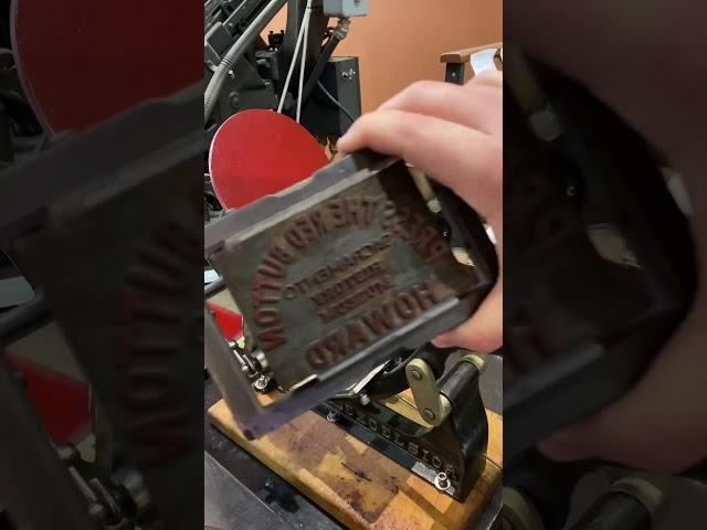 Printing the “Press The Red Button, Howard” woodcut with a tabletop printing press