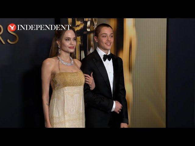 Angelina Jolie and Brad Pitt’s son Knox accompanies mother on red carpet at Governors Awards 2024