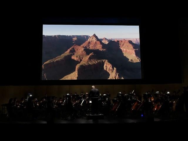 Olympia Symphony Orchestra performs Dvorak's "New World Symphony," with visuals by Adrian Wyard