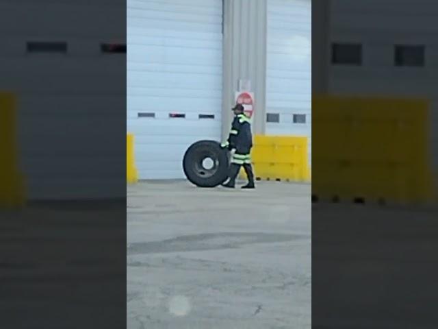 How the conservation of angular momentum eased rolling those heavy truck tires?