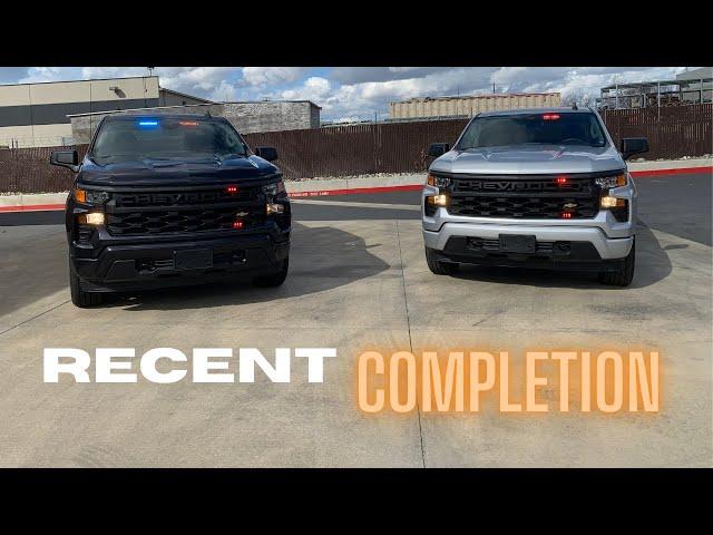 Two Unmarked Law Enforcement Chevy Silverados