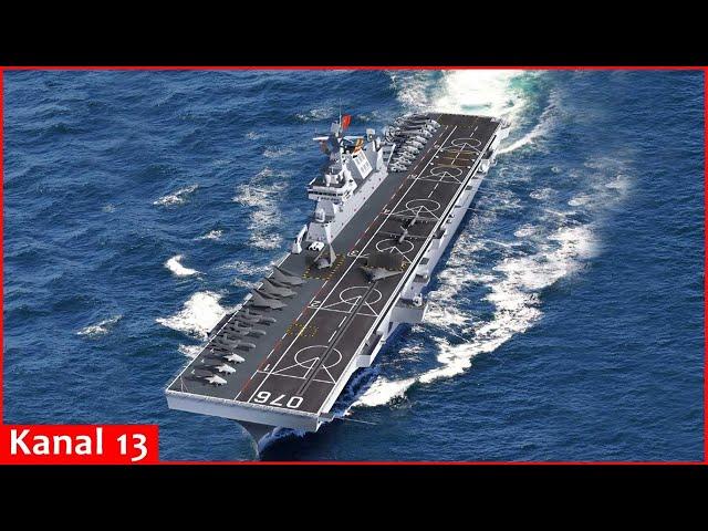 China launches amphibious assault ship that can launch fighter jets