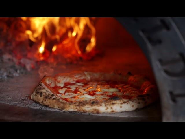 pizza in wood oven 2021 08 27 09 30 12 utc