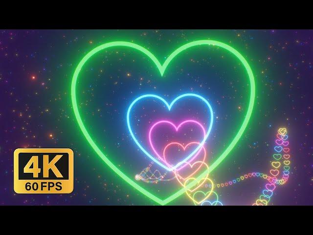 4K Neon Lights Roller Coaster Ride through Heart Background Tunnel and Sparkling Particles 60 FPS