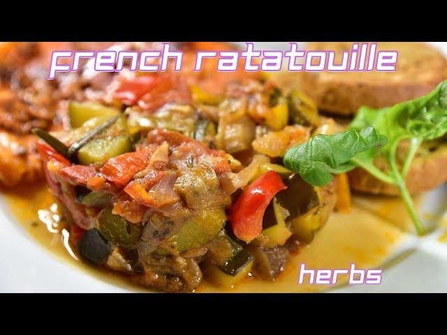 French vegetable stew "Ratatouille" with Mediterranean herbs - colorful and healthy vegetarian dish