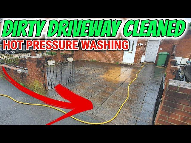 Pressure washing a dirty driveway