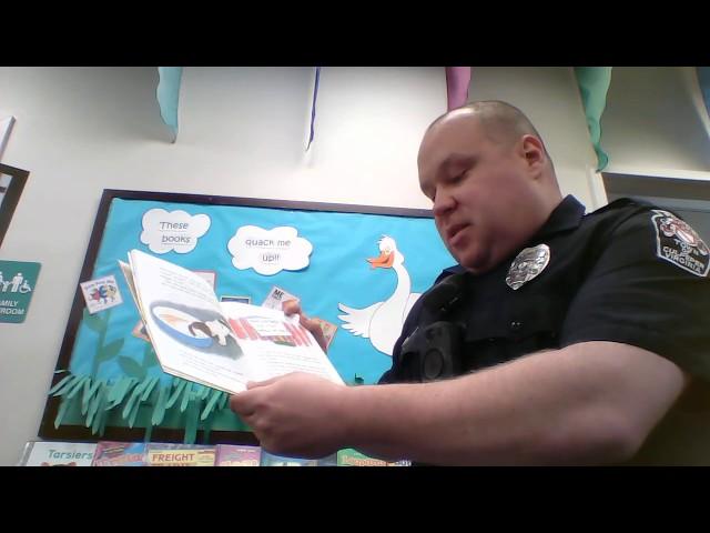 Officer Scott Reads The Poky Little Puppy at Culpeper County Library