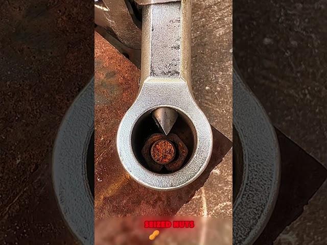 Techniques for removing rust - seized nuts