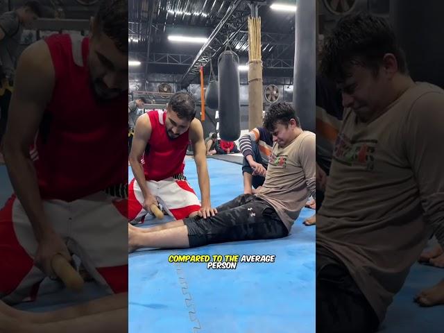 Muay Thai nerve blunting technique, scraping bones with a wooden stick!