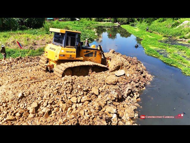 Skillful Shantui DH17c2 Bulldozer Operators are Building Road Foundation And Dump Truck Dumping Soil