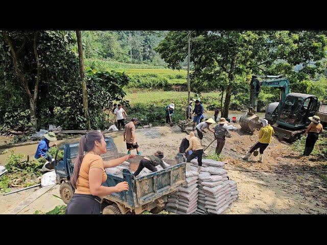 The driver and the girl along with villagers poured concrete into the road.