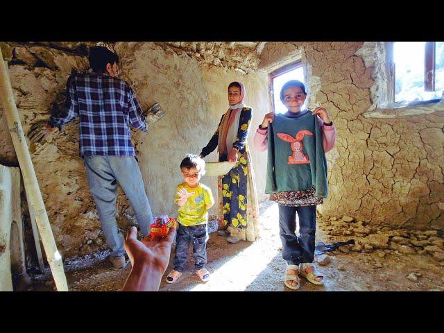 Building a shelter: Plastering with the efforts of nomadic girls and a kind man