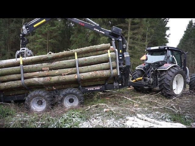 Logging with new Valtra A124 forestry tractor, fully loaded Palms trailer and crane 7,86