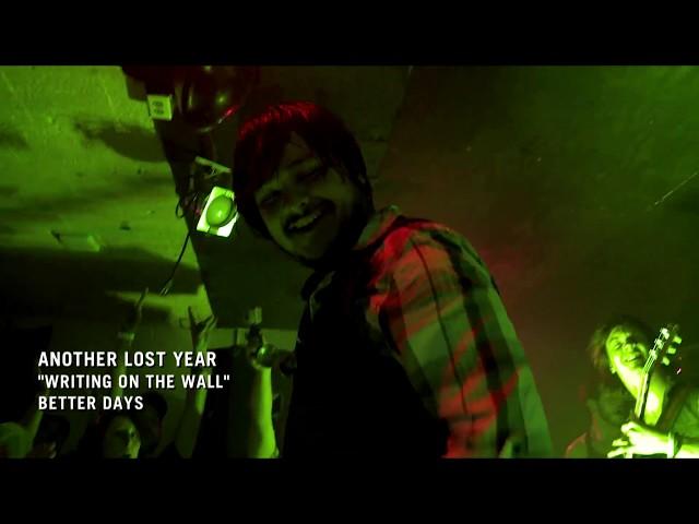 Another Lost Year - Writing On The Wall (Official Music Video)