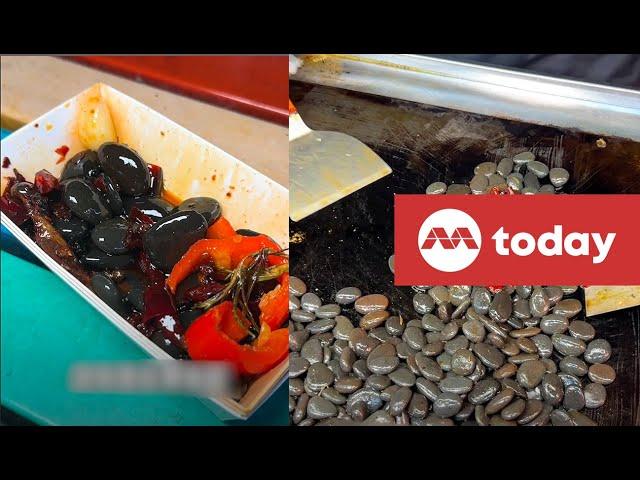 Stir-fried pebbles for snack? Street food sold in China goes viral