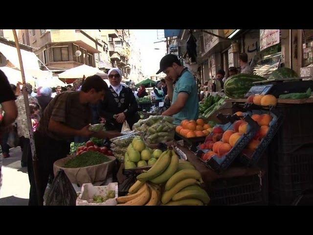 A Damas, la vie continue malgré les menaces de frappe