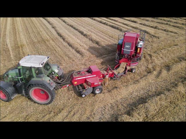 Kleine Ballen zu ein großen Bund der Bale Baron 4245 P und der  Fendt 6275 L bei der Arbeit.