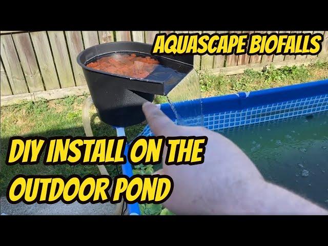 Installing an aquascape biofalls pond waterfall for summer tubbing, backyard fish pond
