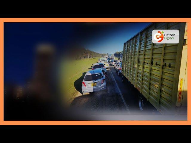 Motorists trapped in traffic jam along Mai Mahiu Road.