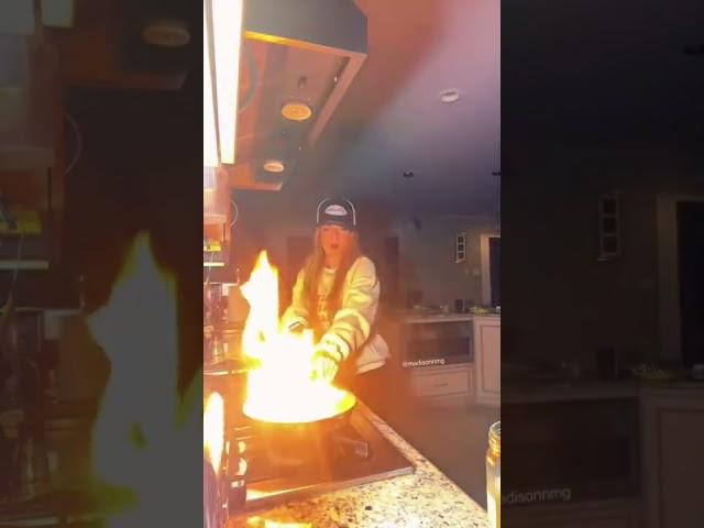 GIRL LEARNS NOT TO USE WATER ON GREASE FIRE THE HARD WAY  #viral