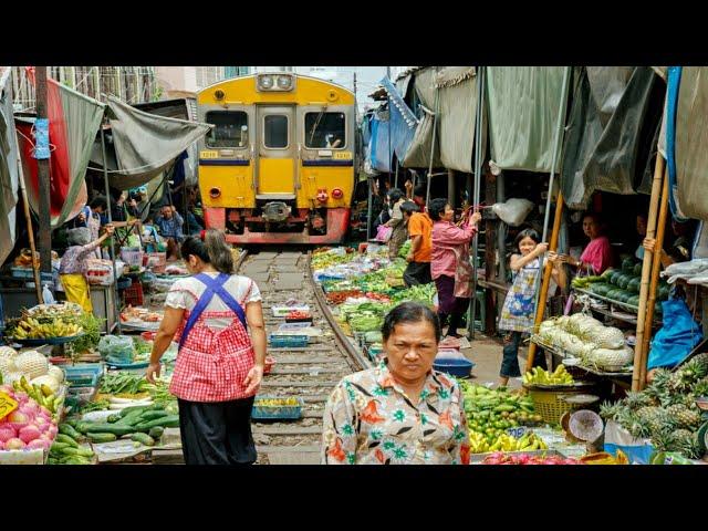 Maeklong railway market Bangkok, thailand | what happened when train is coming? - shockwave