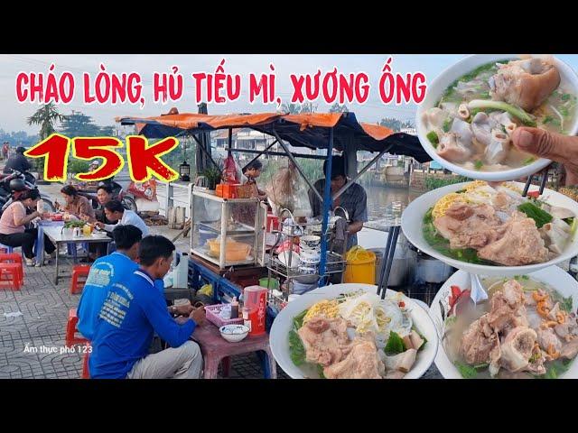 Khách đông khủng khiếp tại xe cháo lòng, hủ tiếu mì xương ống miền quê giá rẻ 15k nằm ven sông