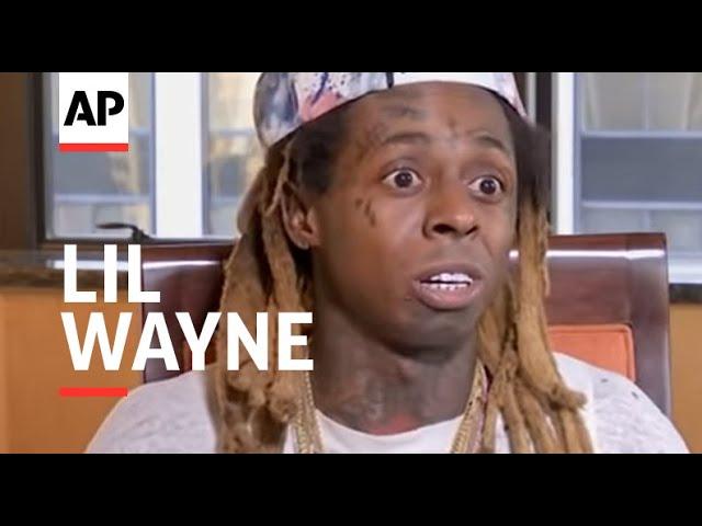 Lil Wayne stands by his 'no such thing as racism' comment.