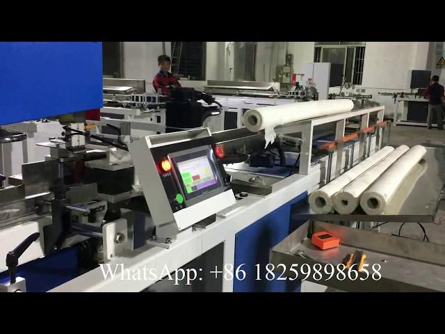 Full auto perforating toilet tissue paper log saw cutting machine