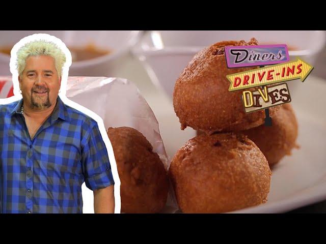 Guy Devours Bobby the Butcher’s Chili Cheese Corn Holes | Diners, Drive-Ins and Dives | Food Network