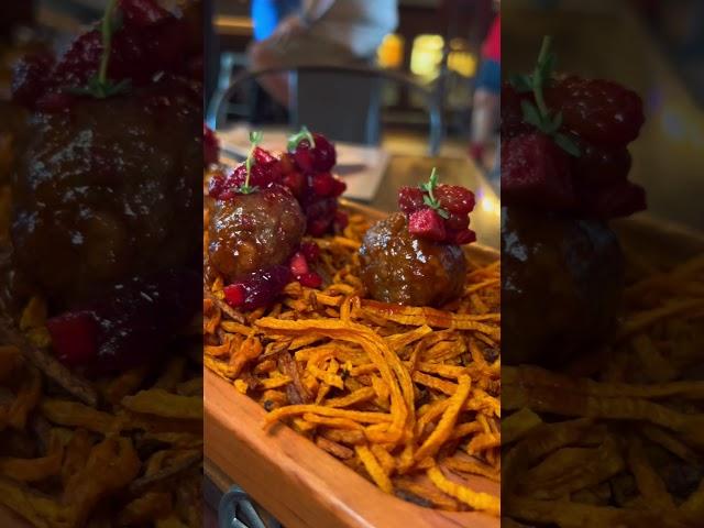 Holiday bar at Disney Springs vegan meatballs. Hangar Bar Holiday Mine Car Meatballs. #vegandisney