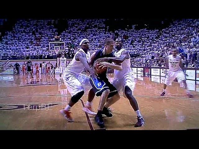 dook's (duke's) Jon Scheyer travels across the court, nothing called.