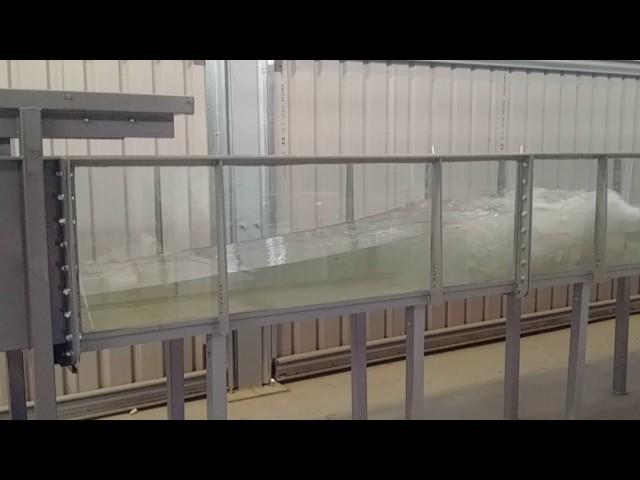 Piston wave maker on teaching flume