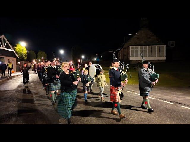 2025 Braemar Mountain Festival torchlight parade led by Pipes & Drums to Highland Centre