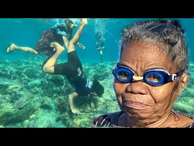 Women Spear Fishing For Survival in Timor Leste (East Timor)