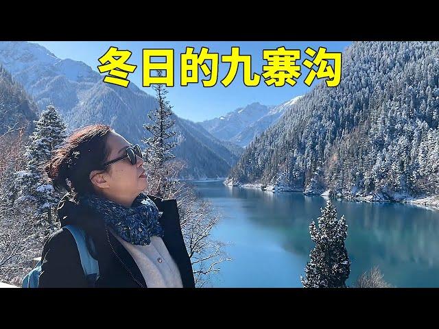 Jiuzhaigou in winter is so beautiful  with sunshine  snow  clear water and blue sky. only when you