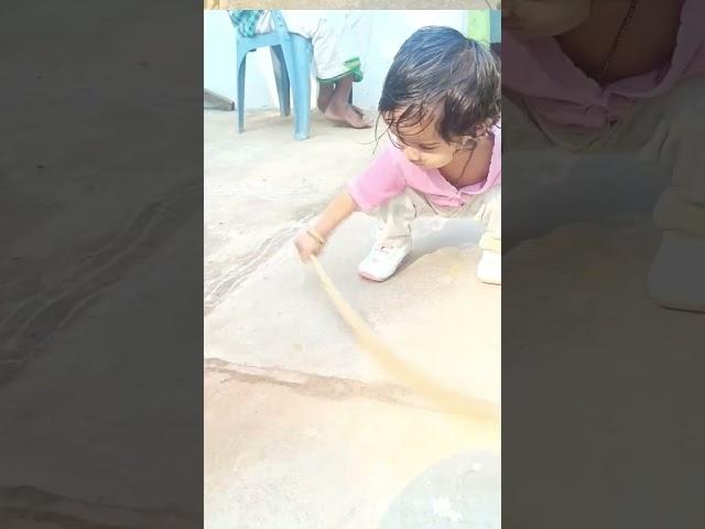 #small active pretty baby cleaning in tiles stones